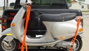 It can fold up flat and vertically against the rear of the vehicle when not in use. The Best Scooter Carriers In 2021 Myproscooter