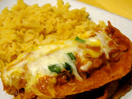 Photos of layered chicken and black bean enchilada casserole. Layered Chicken Enchiladas Spanish Rice Spontaneous Tomato