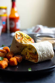 Vegan Breakfast Burrito With Tater Tots And Tofu Scramble Fooduzzi Recipe In 2020 Vegan Breakfast Burrito Tofu Scramble Vegan Breakfast