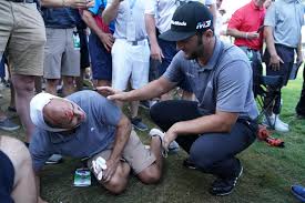 PGA Championship: Fan hit by Jon Rahm's drive leaves with medics
