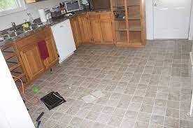 We all usually advise people to install flooring underneath cabinets so that when you go to replace cabinets in the future, you won't risk having gaps with the new cabinets. How To Remove Peel And Stick Floor Tile A Butterfly House