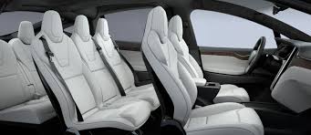 A stark and nearly buttonless interior design is classic tesla. A Look At The Tesla Model X S Vegan Ultra White Interior Video Electrek