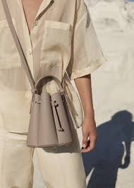 My polene collection is now existing 2 cabas 1 un nano 1 un backpack 2 slg's still eying no 8 and waiting for the ten. Number Eight Mini Taupe Polene Taupe Bag Bucket Bag Polene Paris Bag