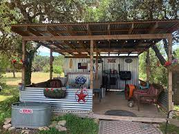 Try these ideas for backyards from hgtv including fire pits, arbors, pergolas and container gardens. Cook Shack Rustic Outdoor Kitchens Fire Pit Backyard Beach Properties