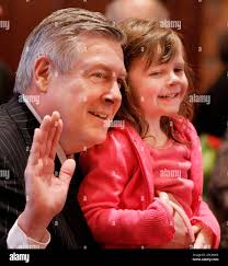 Illinois Sen. Kirk Dillard, R-Westmont, and his daughter Emma, 5, pose for  photos