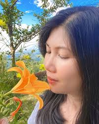 Taking a moment to smell the flowers.