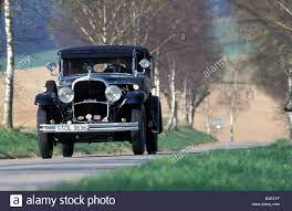 Download This Stock Image Car Maybach Zeppelin Vintage Car 1930s Thirties Black Driving Diagonal Front Front View Zeppelin Vintage Vintage Cars Photo