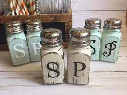This prevents the paint from clogging them. Rustic Salt And Pepper Shaker Set Rustic Salt And Pepper Shakers Salt And Pepper Shakers Rustic Farmhouse Decor Farmhouse Decor Rustic In 2021 Cheap Farmhouse Decor House Decor Rustic Vintage Farmhouse Decor