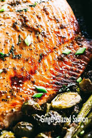A Slightly Sweet Spicy Incredibly Flavorful Ginger Glaze Makes This Oven Baked Salmon Recipe That S Simple To Pre Salmon And Asparagus Salmon Dishes Recipes