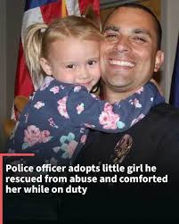 Police officer adopts little girl he rescued from abuse and comforted her  while
