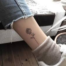 These tattoos have a sweet girlish look that is full of variety and oozes a luscious appeal. Cute Small Rose Ankle Tattoo Small Ankle Tattoos Tiny Rose Tattoos Rose Tattoos For Women Rose Tattoos