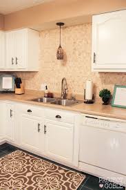 Maybe you would like to learn more about one of these? Kitchen Transformation White Cabinets Painted Counters With White Appliances Project Goble