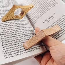 Some of the options include: Amazon Com Yonor Oak Wooden Book Page Holder Handmade Oak Thumb Thing A Novel Reading Accessories Gifts For Readers Book Lovers Gifts Bookworm Gifts Oak Medium 0 85 Office Products