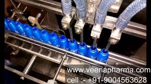 Automatic Coconut Hair Oil Filling And Pressing Machine Coconut Oil Filling Machine Cap Pressing Youtube