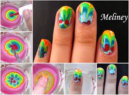 Draw the brush out of the first nail varnish bottle, keeping the brush loaded with polish. Wonderful Diy Rainbow Marble Nail Art