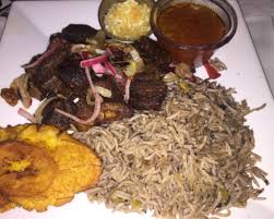 It is made in rice and djon djon, or also known as black mushrooms. Where To Find The Best Haitian Eats In Brooklyn