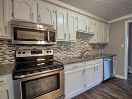 A master painter offers tips on how to paint kitchen cabinets. How To Paint Cabinets The Right Way The Flooring Girl