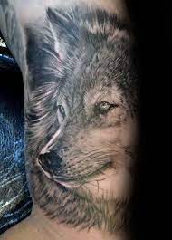 50 Realistic Wolf Tattoo Designs For Men Canine Ink Ideas Wolf Tattoo Design Wolf Tattoo Wolf Tattoo Armel