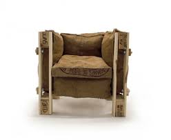 A chair created using recycled newspaper. Iconic Le Corbusier Chair Of Recycled Materials Digsdigs