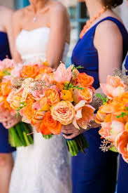 Assembling a team of extremely talented designers and working alongside them makes it easy to go to work every day! Orange Wedding Bouquet Gold Navy Orange Wedding Dana Cubbage Weddings Charleston Navy Orange Weddings Orange Wedding Bouquet Orange Wedding Flowers