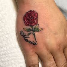 It is good to use creative fonts in designing your tattoo's letterings. Rising Dragon Tattoos Nyc Cute Little Rose And Name Tattoo By Chris