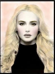 Psst ... her look is designed by Zac Posen.