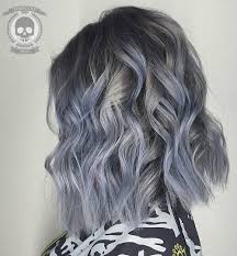 The mix of random white and gray adds fun to this curly hair, and we know that curls are also great for creating volume. 20 Trendy Gray Hairstyles Gray Hair Trend Balayage Hair Designs Hairstyles Weekly
