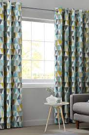 Buy Textured Geo Print Eyelet Curtains From The Next Uk Online Shop Teal Living Rooms Curtains Living Room Cushions On Sofa