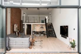 When former industrial spaces were converted into urban apartments, thea loft style adapted industrial features to achieve a cohesive look. Loft Apartments With An Industrial Factory Feel In Northbourne London