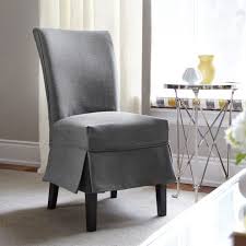 18 Lovely Chair Cover Designs To Refresh The Look Of Every Dining Room Slipcovers For Chairs Dining Room Chair Covers Grey Dining Room Chairs