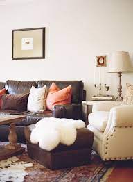 11 Affordable Ways To Make Your Home Feel Cozier Brown Living Room Decor Dark Brown Couch Living Room Living Room Leather