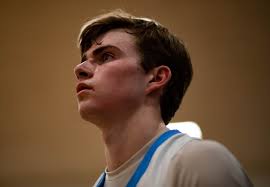 Flint Powers Catholic beats Garber to advance in Michigan high school  basketball playoffs