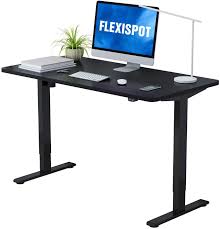 Rectangular black standing desk with adjustable height feature. The 8 Best Standing Desks Of 2021