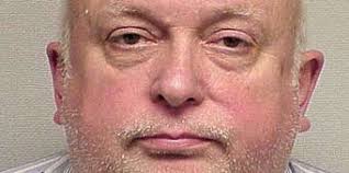 Owner of bookstore with complaint history charged with check fraud