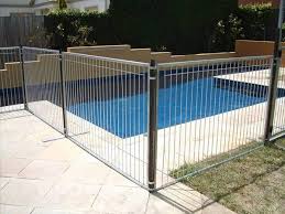 Several Temporary Pool Fencing Are Surrounding Swimming Pool Temporary Pool Fencing Pool Fence Swimming Pools