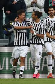 Juventus Forward Paulo Dybala Celebrates With Juventus Defender