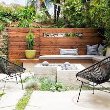 Get garden patio ideas here with our gallery of 29 patios surrounded by lush gardens of tall grasses, plants and trees. Retaining Wall Ideas Patio Design Patio Retaining Wall Patio