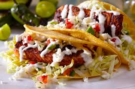 The indoor/outdoor vibe is one of a kind. Grilled Fish Tacos With Tequila Lime Crema Cacique Inc