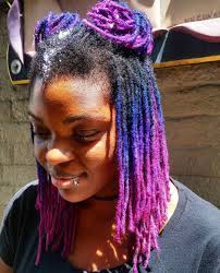 The curls add to the glam factor (her gorgeous red lips don't hurt, either), but it's really the contrast between blonde and brunette that makes this color combo a stunning one. 40 Dreadlocks Hair Color Ideas