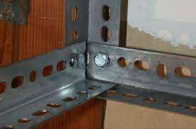 Overhead storage racks are perfect for any home or garage. Overhead Garage Shelves Using Slotted Angle Iron David Frink Overhead Garage Hanging Garage Shelves Diy Garage Storage