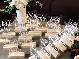 Acrylic Table Numbers Clear Acrylic Table Number Signage Wedding Decor Wedding Event Signs Willow And Ink Wedding Decorations Wedding Signage Wedding Table Numbers