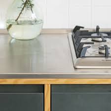 Custom kitchens don't have to cost a fortune; Kitchen Worktop Ideas To Ensure Your Work Surface Is Stylish And Practical