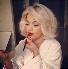 The side bangs which are curled in style frame her face perfectly. Latest Short Blonde Hairstyles Blonde Bob Hairstyles Long Hair Styles Thick Hair Styles