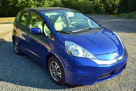 The result is unmatched configurability that is bolstered by the boxy fit's cavernous interior and cargo volumes. 2013 Honda Fit Ev Review Digital Trends