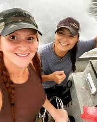 Me and pickle after a long wet day of hunting alligators!