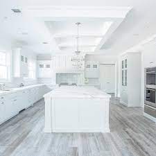 Ceramic tile for kitchen flooring. Ocean Blu Interior Design On Instagram Releasing A Photo Of Our Clients Brand New Kitchen Design White Kitchen Design Wood Floor Kitchen New Kitchen Designs