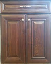 The cabinetry hardware is from atlas in the champagne finish. American Walnut Kitchen Cabinet Doors