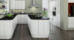 Planar White Fitted Kitchen By Magnet Glossy White With Smooth Curves Would Prefer A Wooden Worktop T White Gloss Kitchen Kitchen Fittings White Kitchen Units
