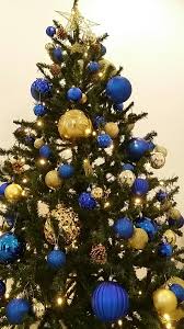 Unique collectible keepsake holiday décor santa ornament trimmed with czech crystals and gold tassel. Blue And Gold Christmas Tree Gold Christmas Decorations Blue Christmas Tree Decorations Christmas Tree Inspiration