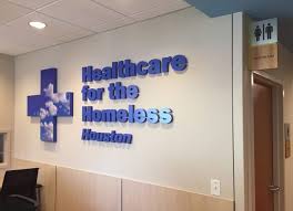 Healthcare For The Homeless Houston Texas Logo Interior Graphics And Projecting Flag Sign Experiential Graphic Design Houston Health Care